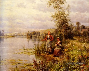 Aston Country femmes après la pêche sur une femme d’été après midi Daniel Ridgway Knight Peinture à l'huile